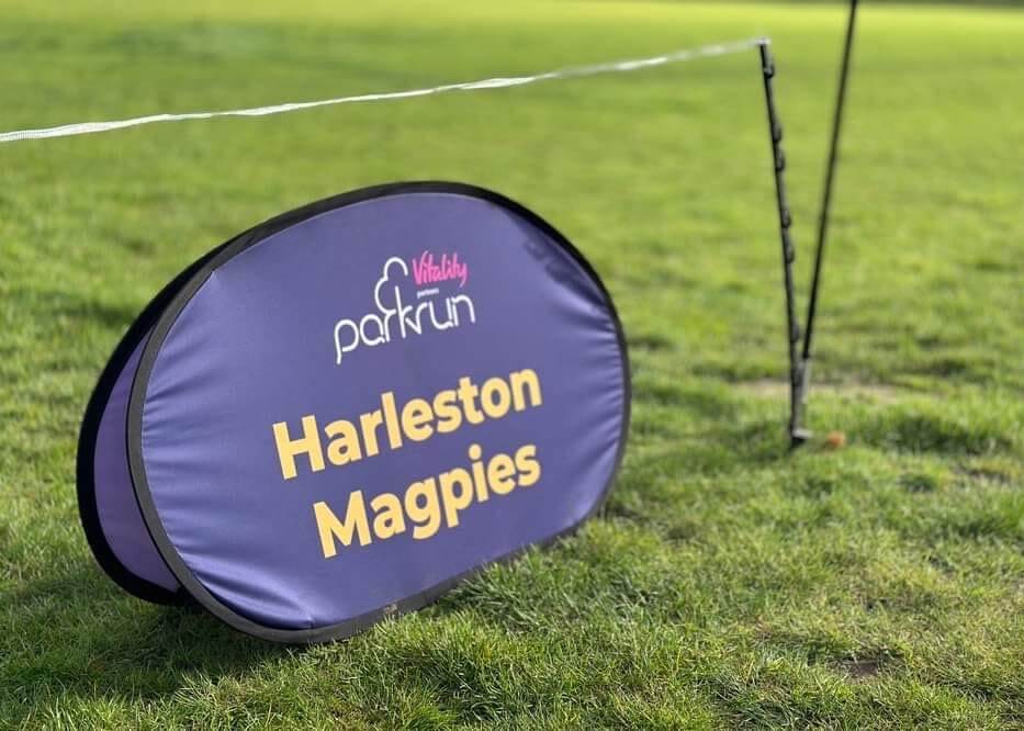 Harleston-Magpies Parkrun Banner on Grass